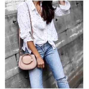 White button down top with blue stars